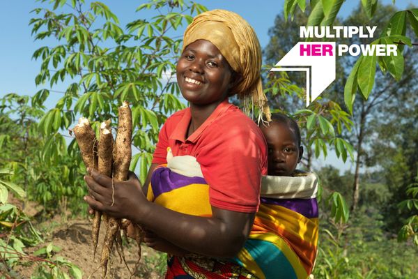 Image of a youth empowerment participant in Rwanda with "Multiply Her Power" graphic overlay