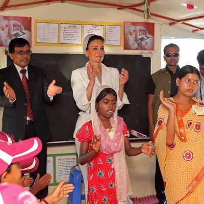 Qatar Foundation for Education, Science and Community Development Chairperson Sheikha Moza bint Nasser enjoys a performance by the students at the inauguration of BRAC’s floating school ‘Shikkha Tori’ in Sunamganj, Bangladesh on 22 October 2012.
