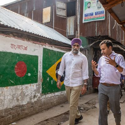 Former International Development Minister of Canada Harjit S. Sajjan takes a tour of various BRAC initiatives at Korail, Bangladesh’s largest slum, accompanied by BRAC Executive Director Asif Saleh.