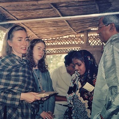 Former US Secretary of State Hillary Clinton and her daughter Chelsea Clinton, in conversation with BRAC founder Sir Fazle Hasan Abed. This photo was taken during their tour to a BRAC school in Bangladesh.