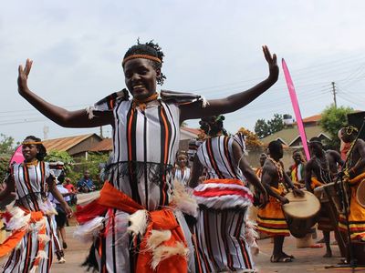 women dancing to music at BUBL BRAC Uganda Bank Limited launch party in Kampala Uganda