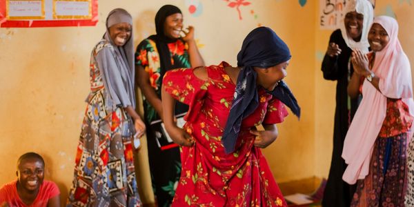 Girls dance in an AIM club. Youth empowerment girls empowerment women girls youth