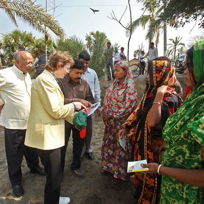 Former President of Ireland, Mary Robinson speaking to a group of women in Koyra, a coastal village in Bangladesh, who are adapting to the climate crisis with Tilapia fish farming. This region is highly impacted by extreme climatic events.