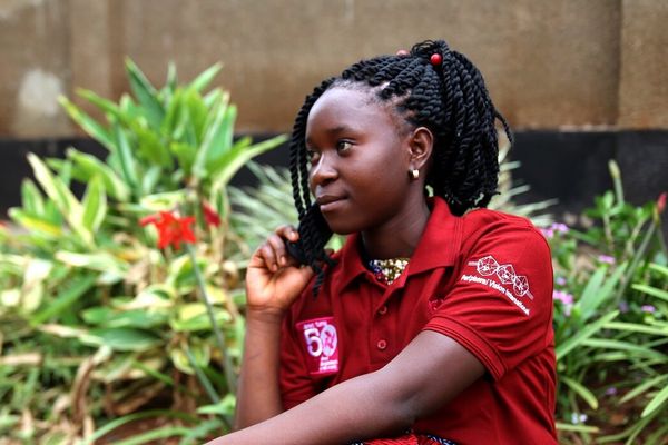 BRAC Girls Talk a girl on a phone in Uganda youth empowerment