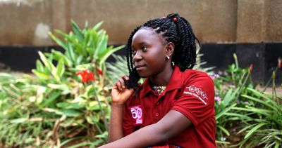 BRAC Girls Talk a girl on a phone in Uganda youth empowerment