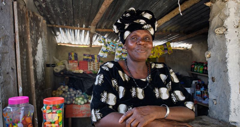 Kumba poses in her shop. Photo by Alison Wright.