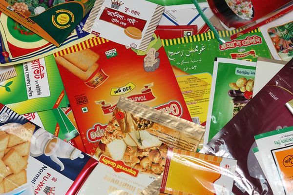 Various colorful plastic packaging packets are shown