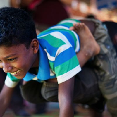 Rohingya child playing in a humanitarian play lab in Cox's Bazar, Bangladesh.