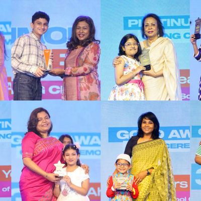 Children receive awards for their academic achievements at BRAC Kumon event
