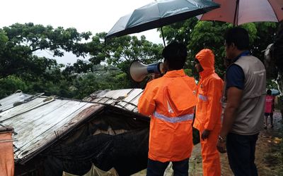 CCCM volunteers giving heavy monsoon alert in camp 5. WhatsApp Image 2026-07-10 at 6.56.58 AM