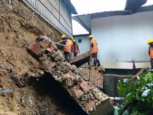 Clearing debris from collapsed wall