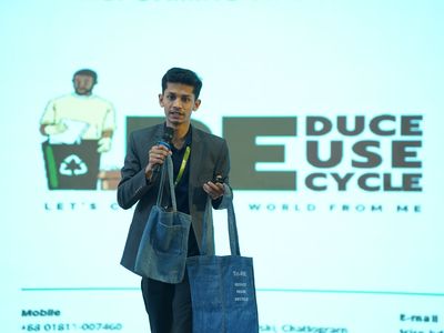 Rimon speaking on stage about TriRE