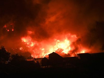 An image showing a fire blazing in Korail Slum, Dhaka, Bangladesh