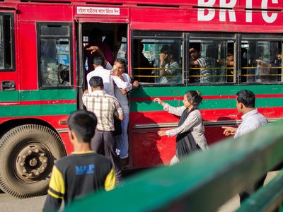 BRAC Bangladesh | Urban Development, people hopping on a crammed bus