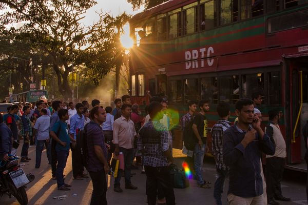 BRAC Bangladesh | Urban Development, people walking on the street at dusk