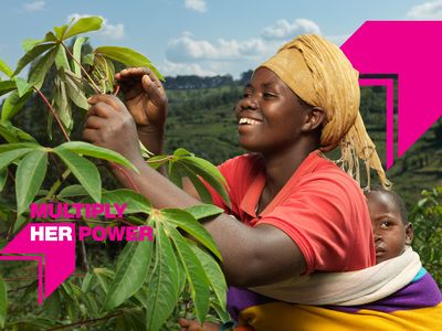 Multiply her power homepage header with photo of Angelique in Rwanda with her son