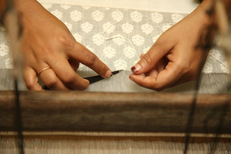 Enterprise-Aarong-artisan-working-with-hands
