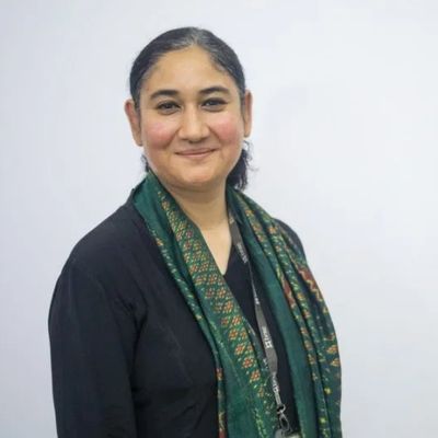 Dr Erum Mariam smiles at the camera