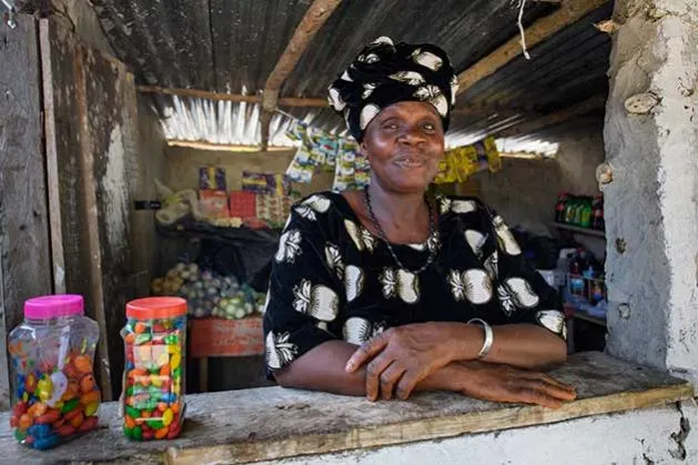 A Liberian participant in BRAC’s Graduation pilot in her store. Credit: Alison Wright
