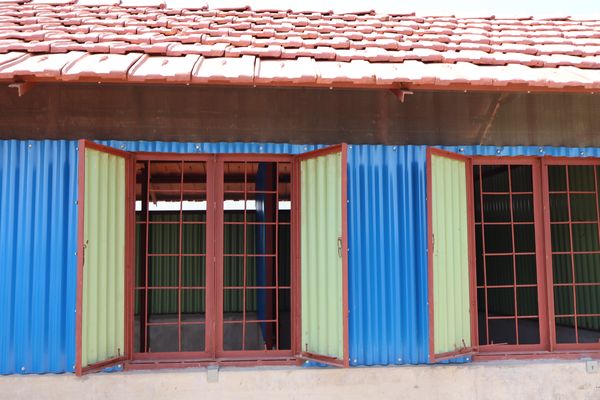 A bright colored shelter will keep Rohingya families cooler, and safer