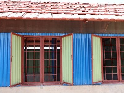 A bright colored shelter will keep Rohingya families cooler, and safer