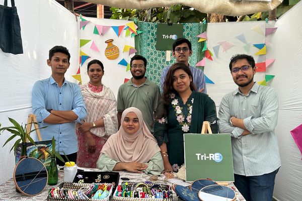 Rimon Barua with TriRE team and stall