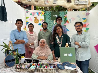 Rimon Barua with TriRE team and stall