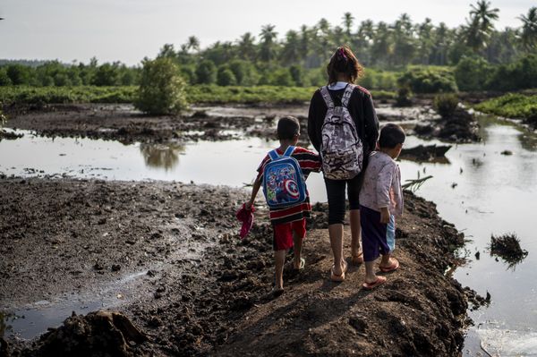 Sitti crosses a forest and a river just to get to school. - Header Image