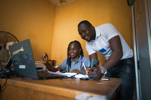 Mustapha, the Success Project coordinator with Zainab an Accountant in the office