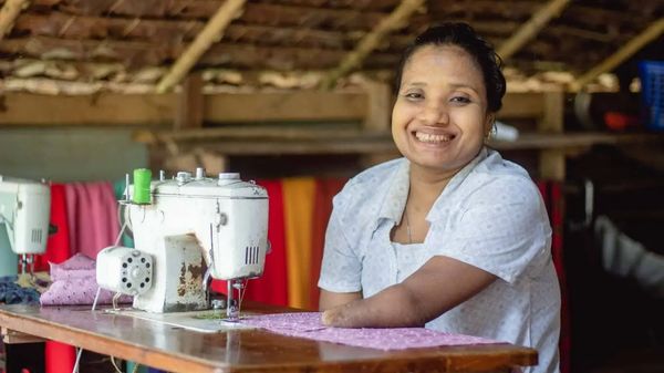 Myanmar client with sewing machine