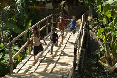 Photo 1_Rohingya children on a bamboo bridge built by Shelter Sector at Camp 17 Block A in Cox_s Bazar