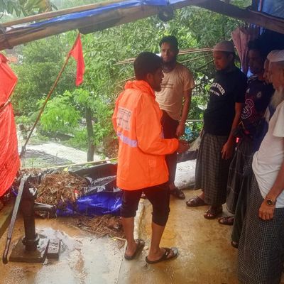 BRAC staff and volunteers go to door to door sharing updates and warnings to Rohingya refugees about heavy monsoon rains