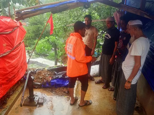 BRAC staff and volunteers go to door to door sharing updates and warnings to Rohingya refugees about heavy monsoon rains