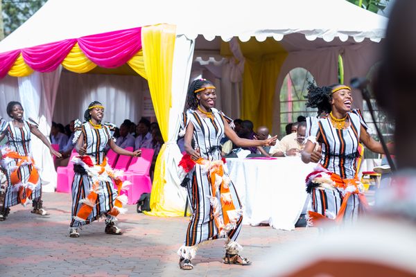 women dancing to music at BUBL BRAC Uganda Bank Limited launch party in Kampala Uganda