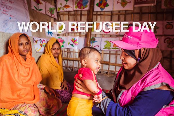 BRAC worker in Rohingya refugee camps holds baby with WRD overlay
