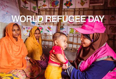 BRAC worker in Rohingya refugee camps holds baby with WRD overlay