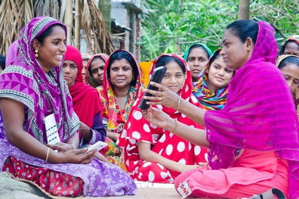 A group of women participating in a microfinance group in Bangladesh.