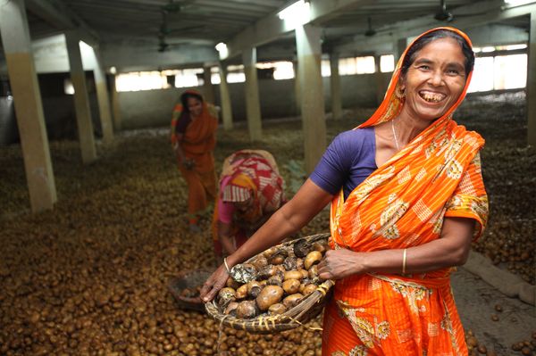 BRAC Bangladesh, woman carrying a basket