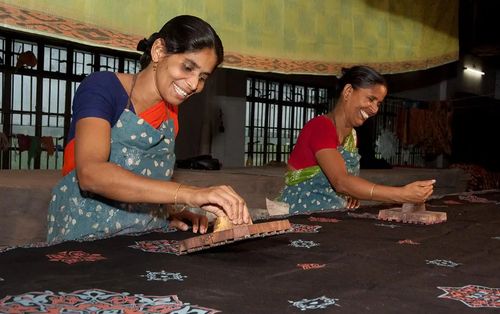 Skilled artisans working together on their craft