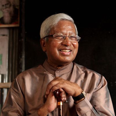 Image of Sir Fazle Hasan Abed in a BRAC classroom