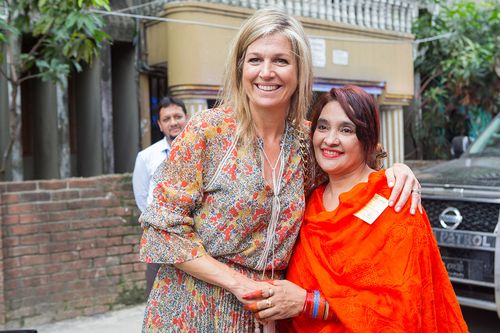 The queen and Jhorna hugging