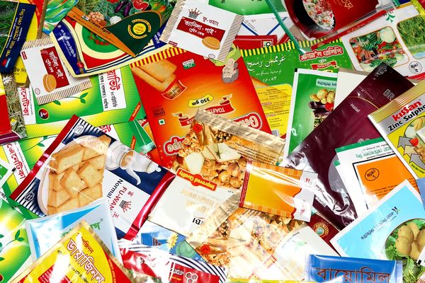 Various colorful plastic packaging packets are shown