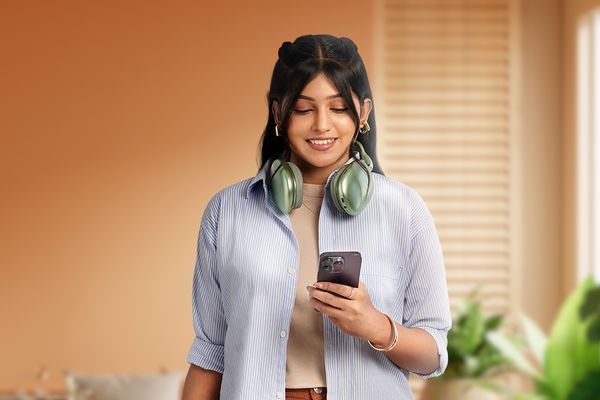 Photo of woman looking down at her phone